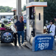 I was only able to snap this 1 lousy photo on the way to work, but how often do you see vintage race cars at the pump?